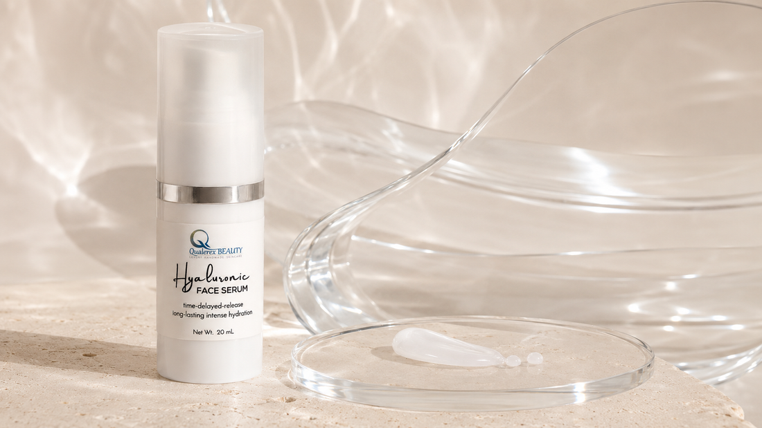 Qualerex Hyaluronic Face Serum with multi-weight hydration serum texture on a luminous glass and ivory background.