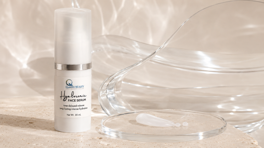 Qualerex Hyaluronic Face Serum with multi-weight hydration serum texture on a luminous glass and ivory background.