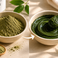 Clay mask transformation from powder to paste in a bowl with a spoon and leaves on a neutral background.